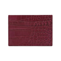 Tarjetero vinotinto Maison Caviar Cannes de cuero con múltiples compartimentos y diseño elegante para tarjetas y documentos.